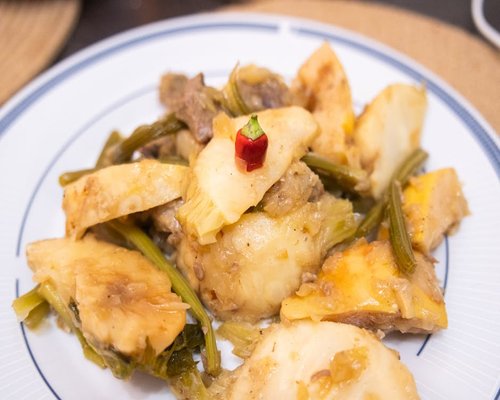A plate of traditional homemade food with vegetables