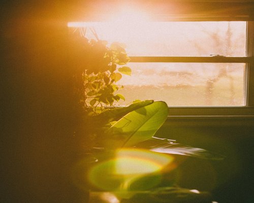 Soft morning sunlight coming through a window